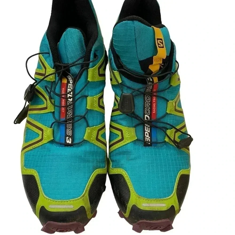 Saloman women’s size 10 sneaker. See pics for wear on bottom.